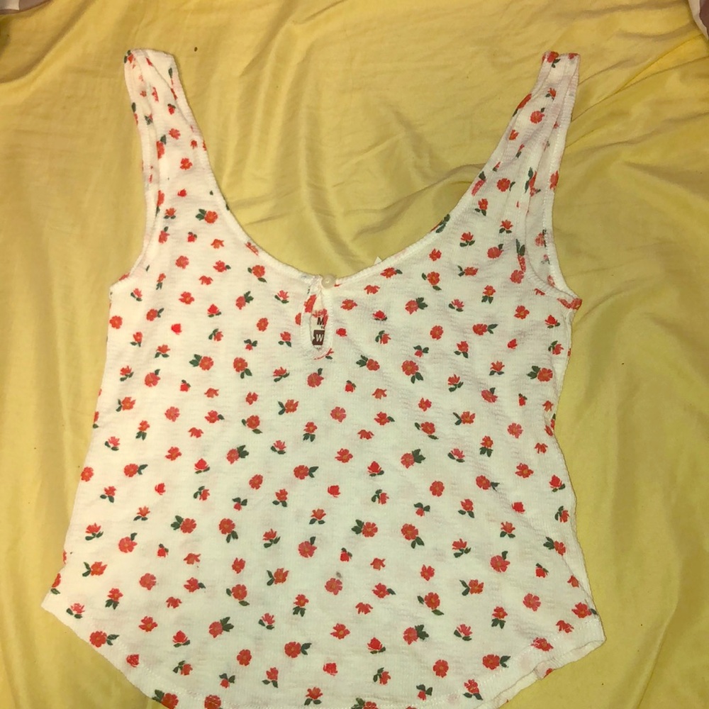 Medium slightly cropped white tank top.